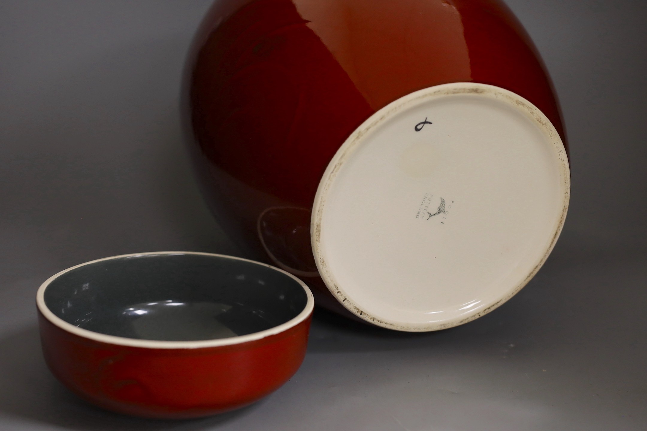 A large Poole Volcano design jar and cover, 32cm high
